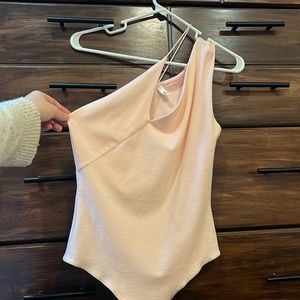 Pink one shoulder bodysuit